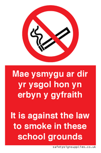 Mae ysmygu ar dir yr ysgol hon yn erbyn y gyfraith It is against the law to smoke in these school grounds - Bilingual Welsh / English